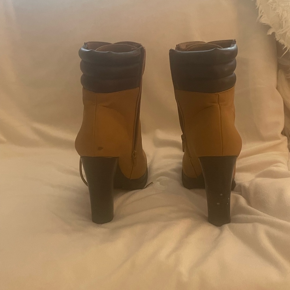 Jennifer Lopez high heel combat boot